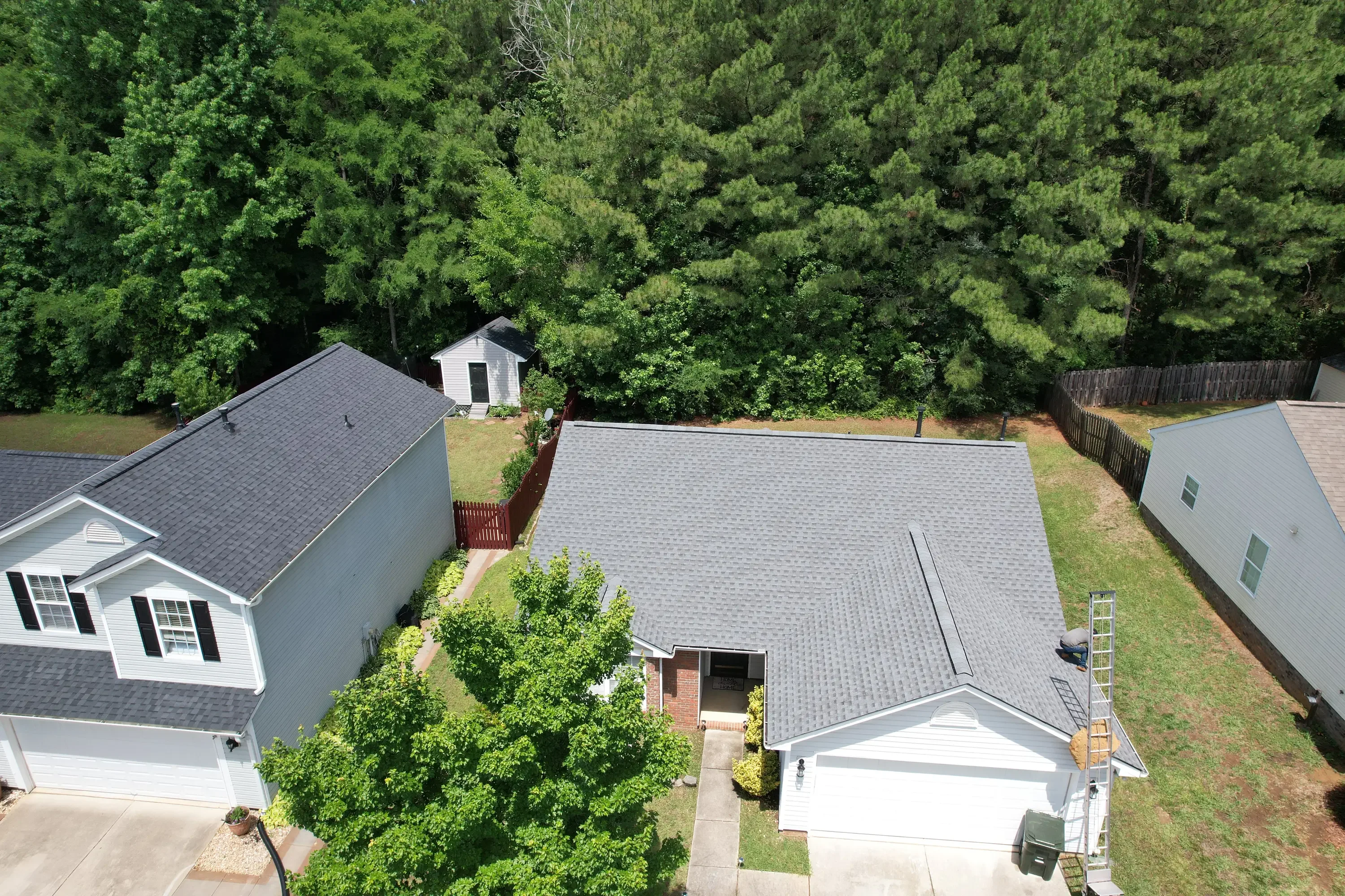 Aerial view of residential home with new gray asphalt shingle roof in Shelby, NC